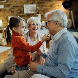 Small girl spending time with her grandparents home