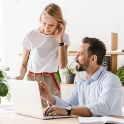 A couple reviewing their health insurance policies